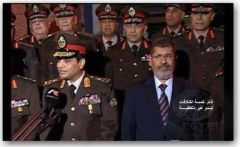 مرسي في احتفال عسكري كالفأر الجربان